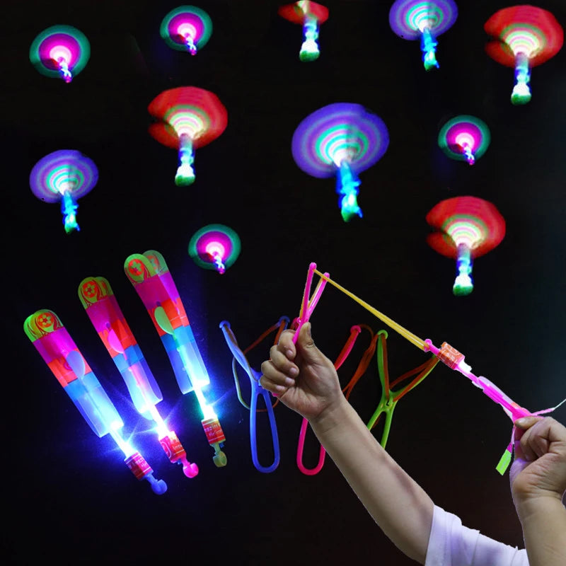 Glow-in-the-Dark LED Arrow Flying Toy – Rubber Band Catapult Rocket for Outdoor Fun